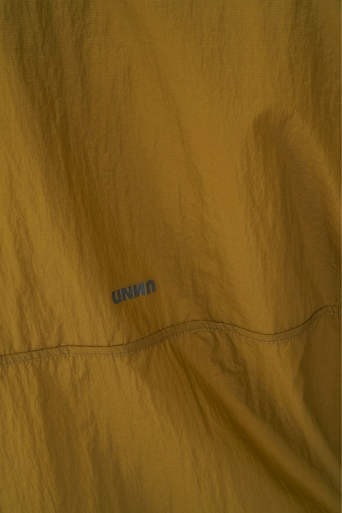 UNNA Smiles Windstopper - Gold Olive
