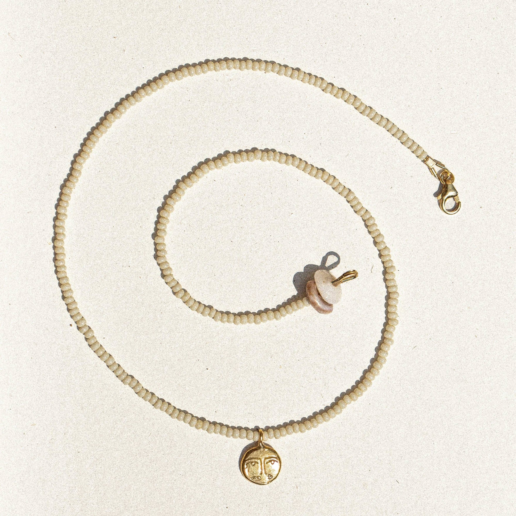 Rauw Jewelry - Face Charm / Coconut Beads